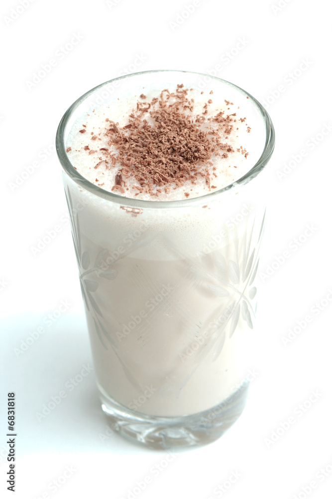 Glass with dairy chocolate drink on a white background Glass with dairy chocolate drink on a white background