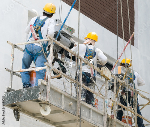Three Painters Working on A Gondola