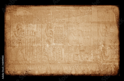 Egyptian sings on the wall, grunge background