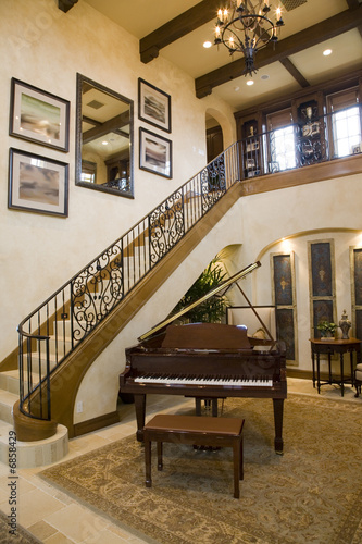 Luxury home grand piano and stairs.