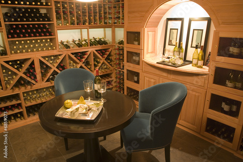 Wine cellar with seating for two.