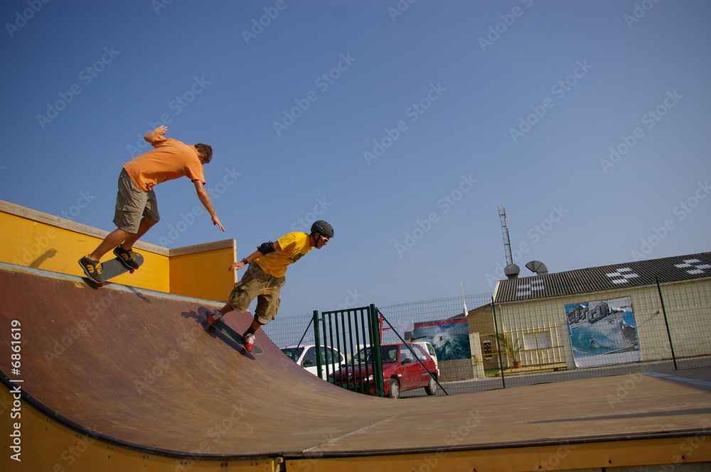 2 skaters on a mini ramp 2 skaters on a mini ramp