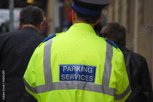 Patrolling traffic warden photo