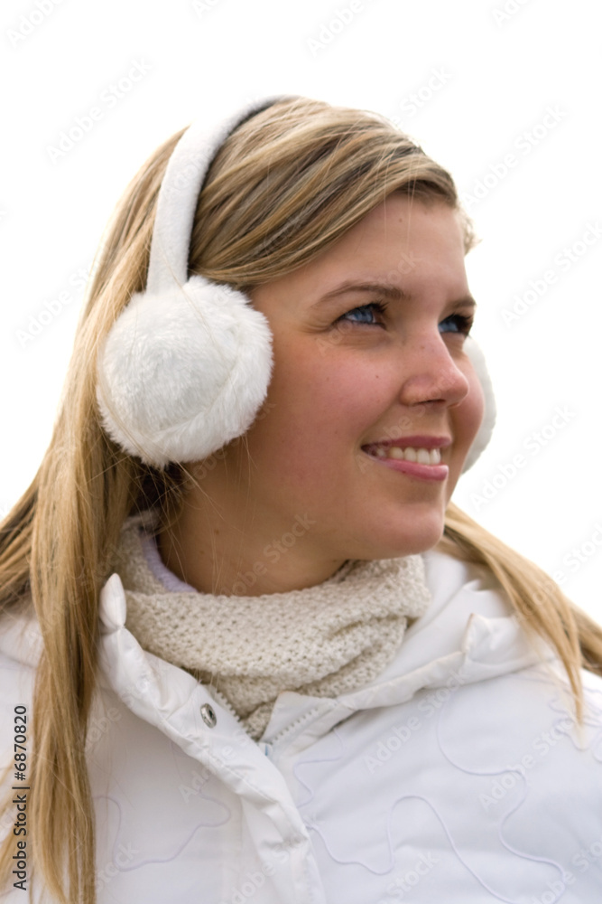 Smiling girl in headset ear muffs