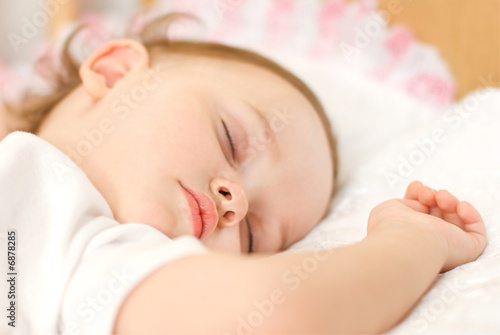 sweet baby sleeping on a pillow