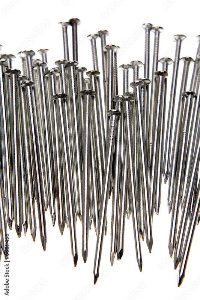 Steel nails over white background Steel nails over white background