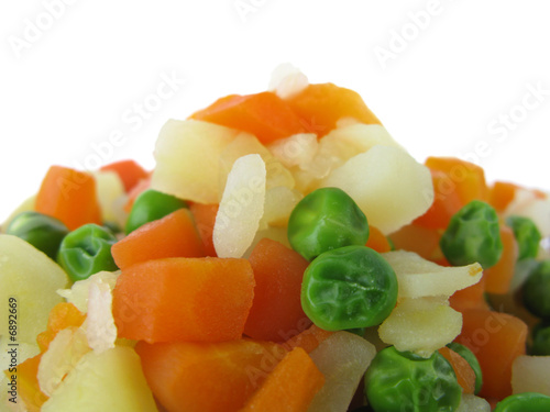 Frozen vegetables mix on white background