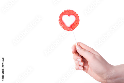 hand with lollipop