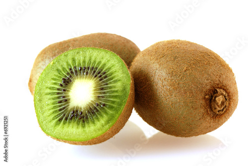 two kiwi fruites with half photo