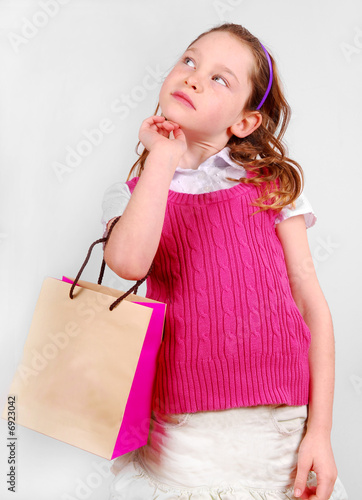 Thoughtful Girl with Shopping Bag