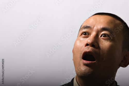 man with sweating face appears shocked