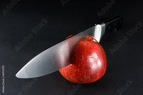 Perfect cut - apple and knife photo