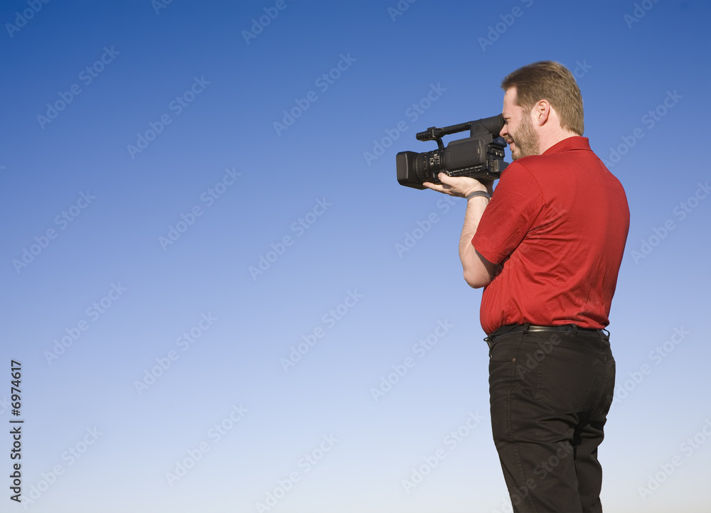 Videographer shooting footage