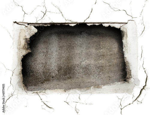 crushed hole at the white wall