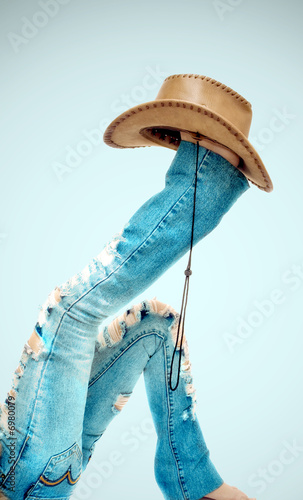 legs with hat on background