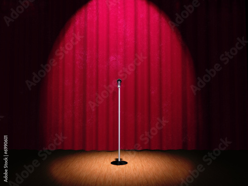 A microphone on a stage photo