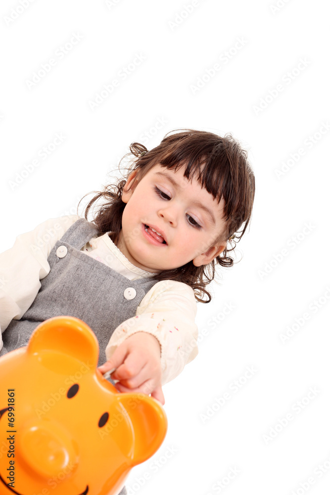 girl and piggy bank