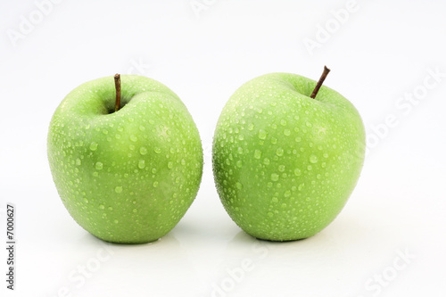two fresh apples on white