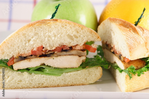 halved chicken breast sandwich