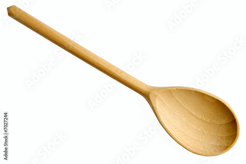 New wooden spoon isolated on a white background. photo