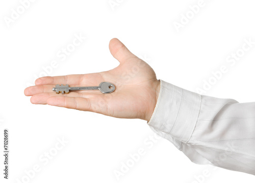 Businessman hand, holding key isolated