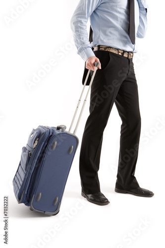 Businessman with suitcase at the airport