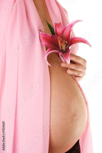 pregnant woman with a flower