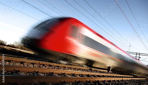 Fast train with motion blur #7043624