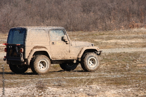 muddy off-road car