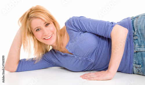 Beautiful Smiling Blonde Lying Down and Relaxing