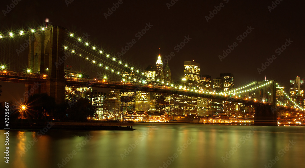 Brooklyn Bridge and Manhattan skyline by night