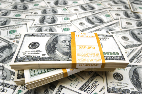 Background with many american hundred dollar bills