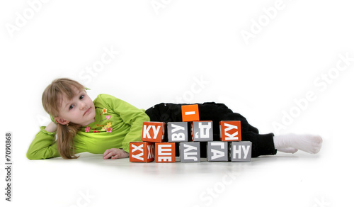 little girl play with bricks