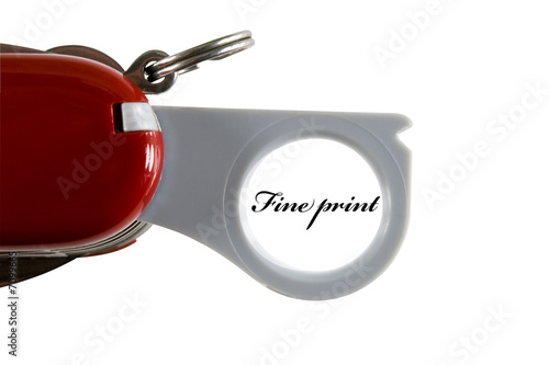Magnifying glass on a pocket knife and fine print