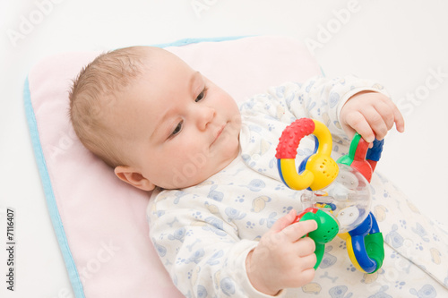 playing with rattle