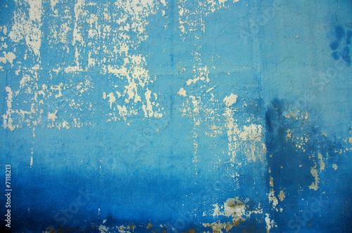 Old wall with cracked blue ...