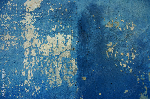 Old wall with cracked blue ...
