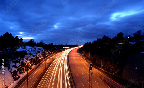 cars at night with motion blur. photo