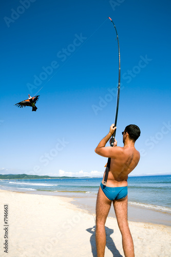 man.kite.beach