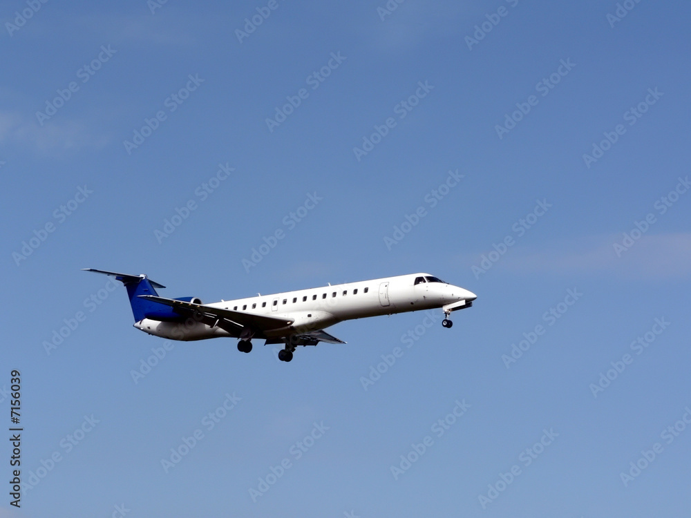 jet plane in flight - landing side view jet plane in flight - landing side view