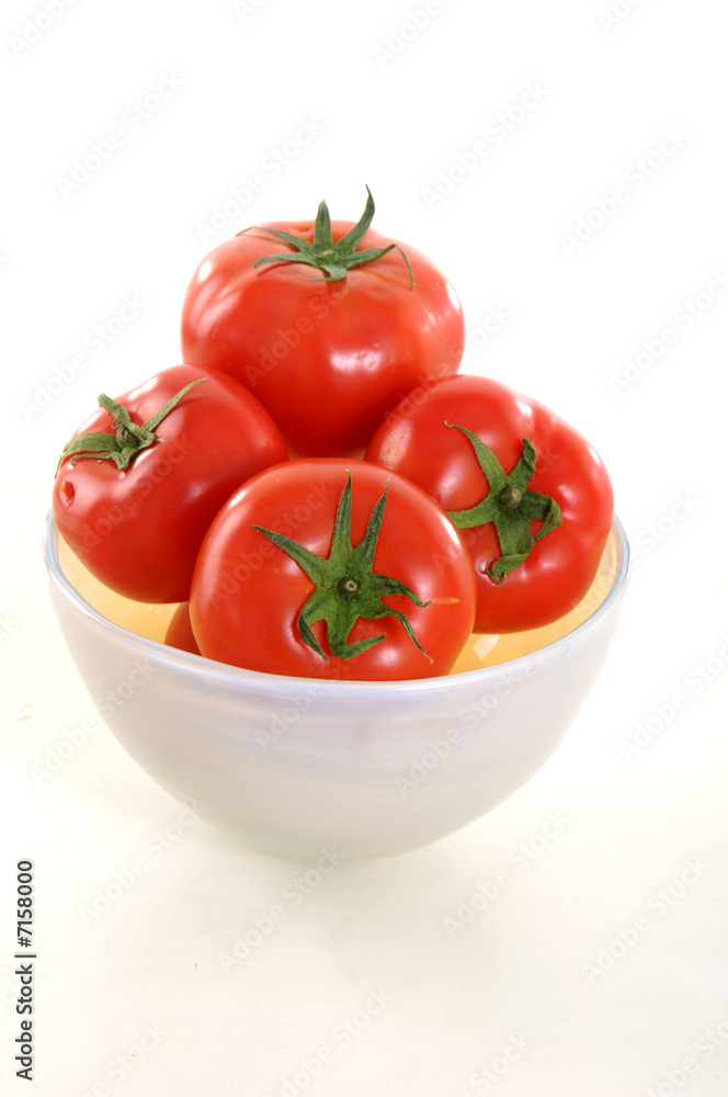tomatoes in the bowl on white background tomatoes in the bowl on white background