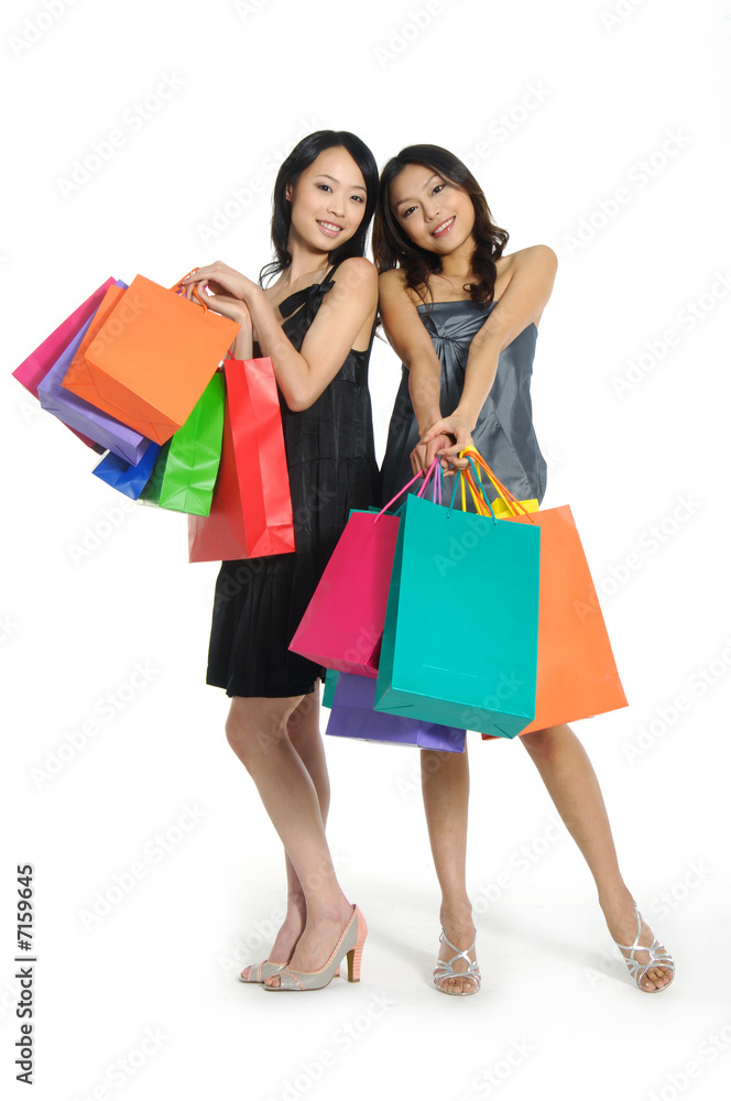Shopping pretty woman with colored package