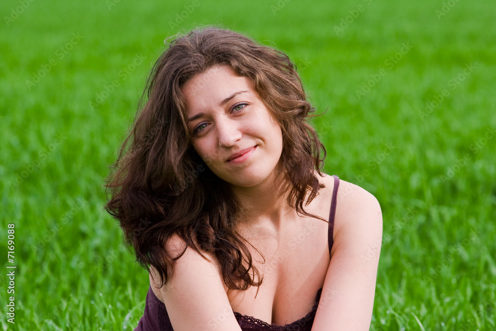Beautiful lady in a grassfield Beautiful lady in a grassfield