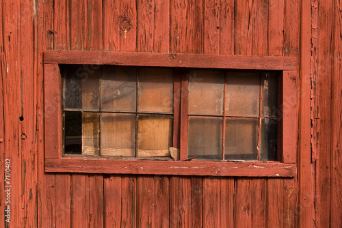 Rustic window in a red barn