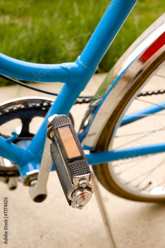 Pedal and middle part of a bicycle. Shallow depth-of-field.
