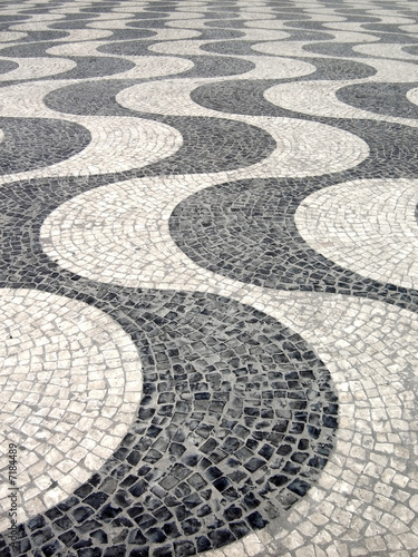 Detail of a typical portuguese cobblestone hand-made pavement