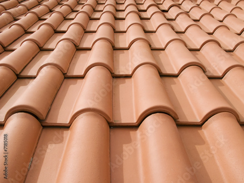 New orange roof tiles close up detail