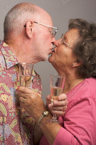 Kissing Senior Couple make ...