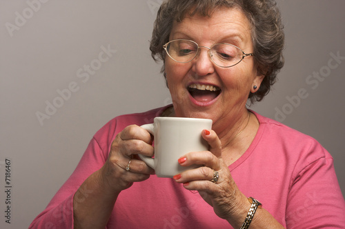 Senior Woman Enjoys Her Coffee