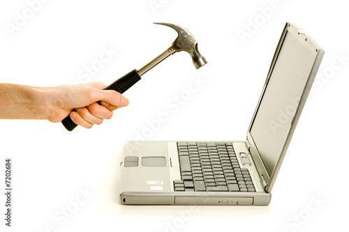 Smashing laptop with a hammer